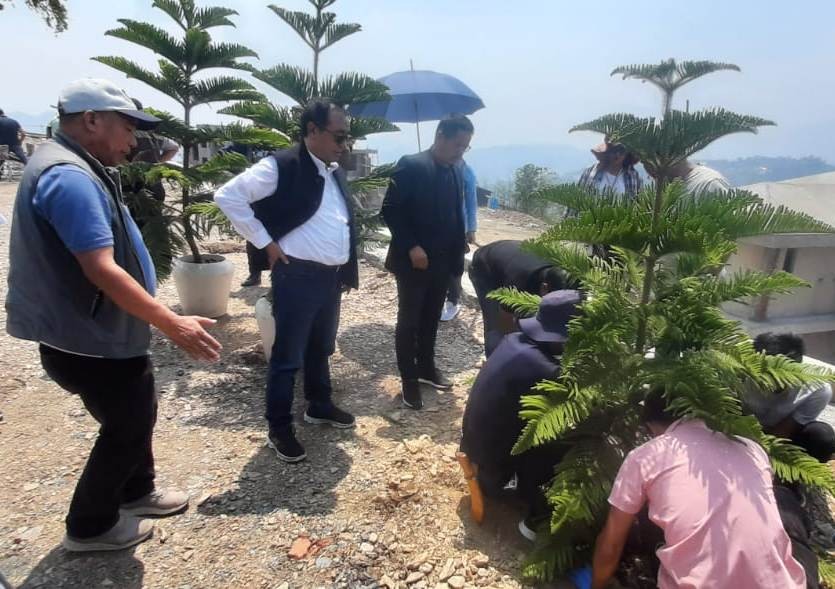 Advisor TN Mannen takes part in the tree plantation at new High Court Complex, Meriema on April 14.